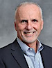 TASI President & CEO: John T McKenna